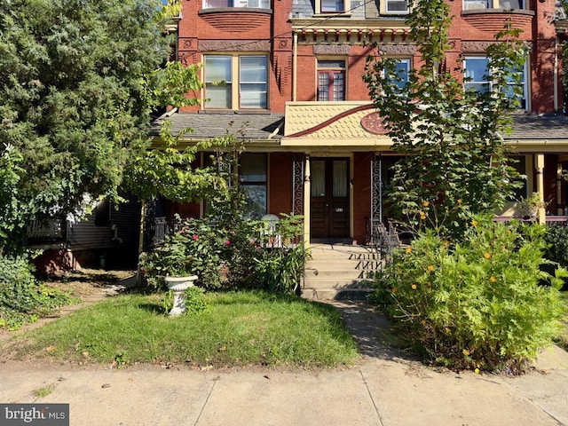 911 E King St, Lancaster, PA 17602 - view of front of house with brick siding