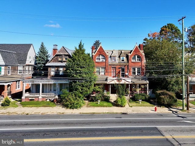 911 E King St, Lancaster, PA 17602 - view of front of home with a chimney