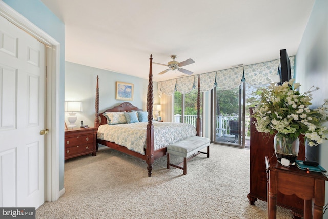 carpeted bedroom with access to exterior and ceiling fan
