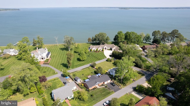 bird's eye view with a water view and a residential view