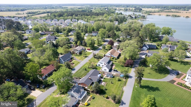 bird's eye view with a water view and a residential view