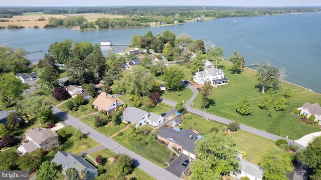 bird's eye view featuring a water view and a residential view