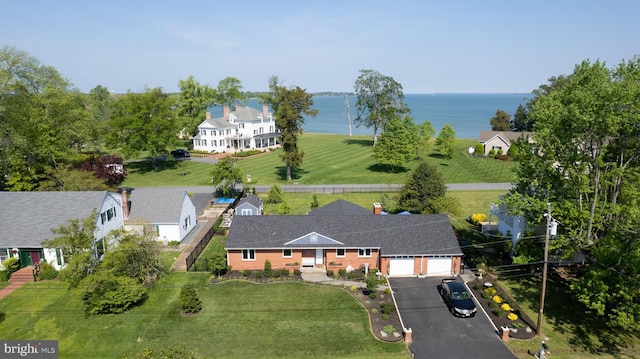 bird's eye view with a water view