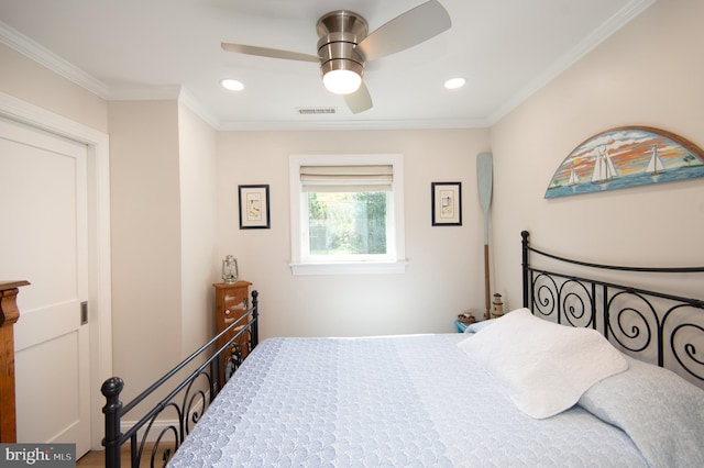 bedroom with crown molding, visible vents, and recessed lighting