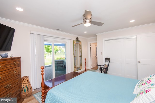bedroom featuring access to exterior, a closet, light wood-style flooring, ornamental molding, and recessed lighting