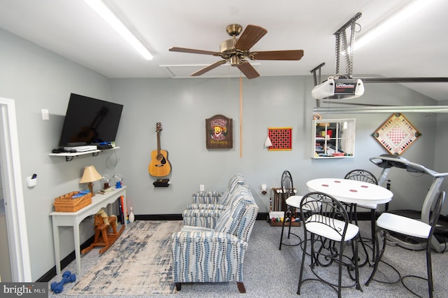playroom with attic access, baseboards, and a ceiling fan
