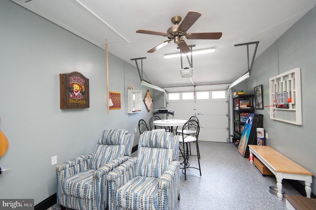 garage featuring a ceiling fan and a garage door opener