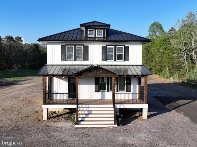 711 Tuckahoe Rd, Vineland, NJ 08360 - modern inspired farmhouse with a porch, metal roof, a standing seam roof, and stairs