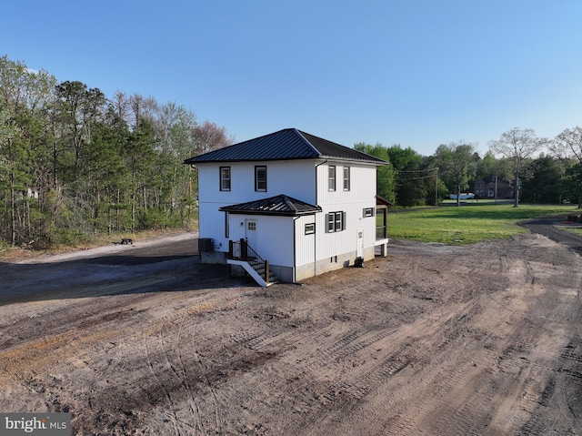 711 Tuckahoe Rd, Vineland, NJ 08360 - view of property exterior with metal roof and a standing seam roof