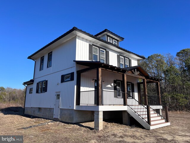 711 Tuckahoe Rd, Vineland, NJ 08360 - view of property exterior with a porch