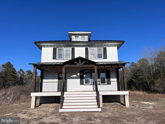 711 Tuckahoe Rd, Vineland, NJ 08360 - traditional style home featuring covered porch, metal roof, and a standing seam roof