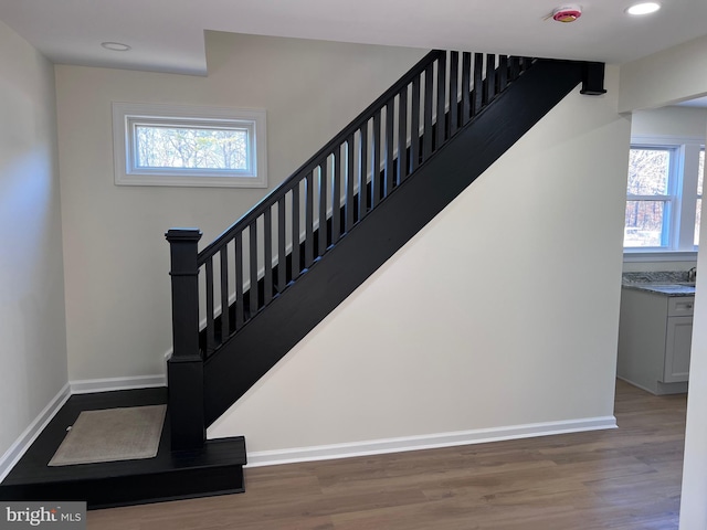 711 Tuckahoe Rd, Vineland, NJ 08360 - stairs featuring a wealth of natural light, baseboards, and wood finished floors