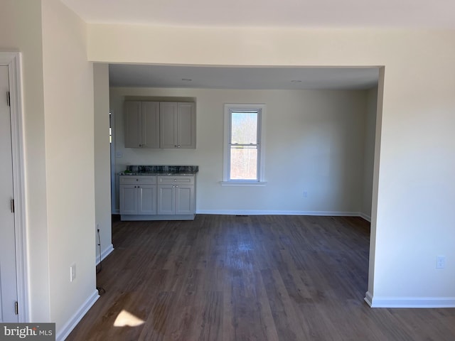 711 Tuckahoe Rd, Vineland, NJ 08360 - interior space with baseboards and dark wood-style floors