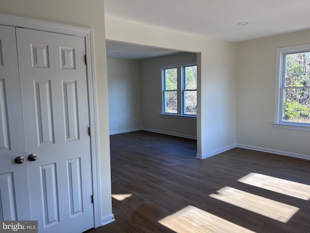 711 Tuckahoe Rd, Vineland, NJ 08360 - spare room with baseboards and dark wood-style flooring