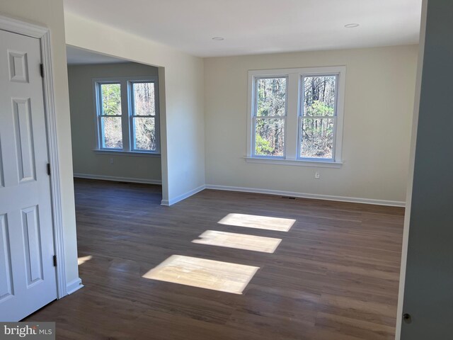 711 Tuckahoe Rd, Vineland, NJ 08360 - unfurnished room featuring recessed lighting, baseboards, and dark wood-style floors