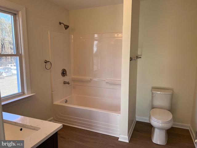 711 Tuckahoe Rd, Vineland, NJ 08360 - full bath featuring toilet,  shower combination, baseboards, and wood finished floors