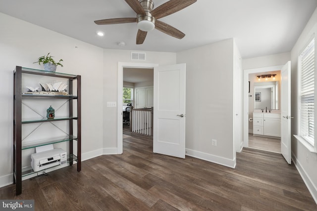 1653 Bandit Loop, Reston, VA 20190 - unfurnished bedroom featuring baseboards, dark wood-type flooring, recessed lighting, ensuite bath, and a ceiling fan