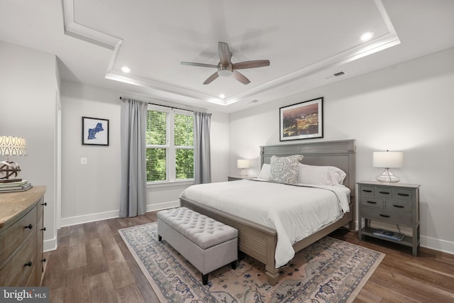1653 Bandit Loop, Reston, VA 20190 - bedroom featuring a tray ceiling, dark wood finished floors, baseboards, recessed lighting, and ceiling fan