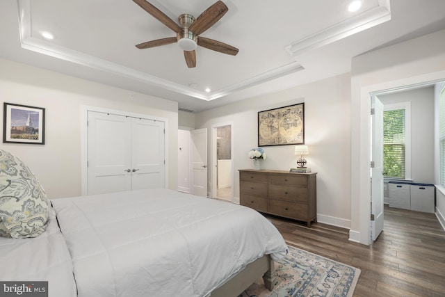 1653 Bandit Loop, Reston, VA 20190 - bedroom featuring a raised ceiling, wood finished floors, recessed lighting, baseboards, and ensuite bathroom