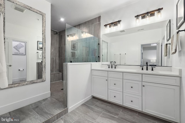 1653 Bandit Loop, Reston, VA 20190 - bathroom with a walk in shower, double vanity, baseboards, and recessed lighting