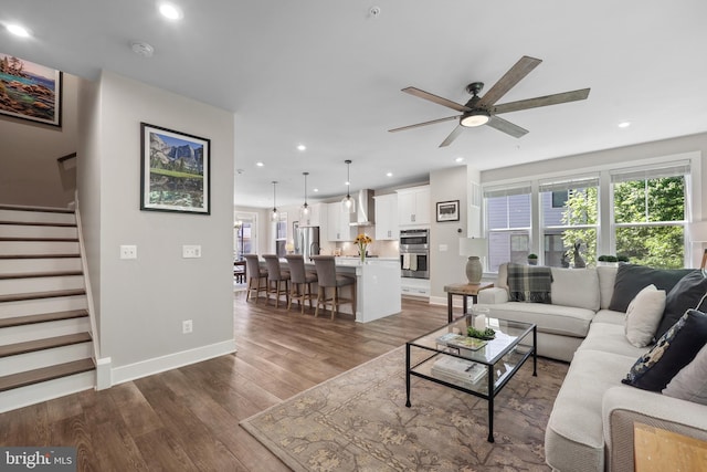 1653 Bandit Loop, Reston, VA 20190 - living room featuring ceiling fan, healthy amount of natural light, wood finished floors, baseboards, and recessed lighting