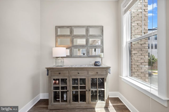 1653 Bandit Loop, Reston, VA 20190 - detailed view of baseboards, wood finished floors, and a bar