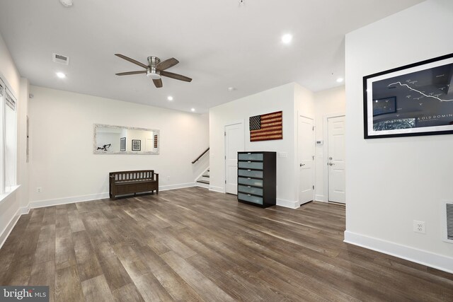 1653 Bandit Loop, Reston, VA 20190 - unfurnished living room with ceiling fan, dark wood-style flooring, stairs, baseboards, and recessed lighting