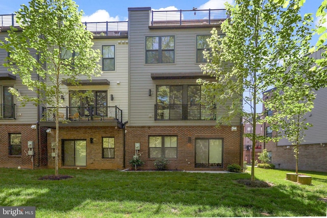 1653 Bandit Loop, Reston, VA 20190 - back of property featuring a yard and brick siding