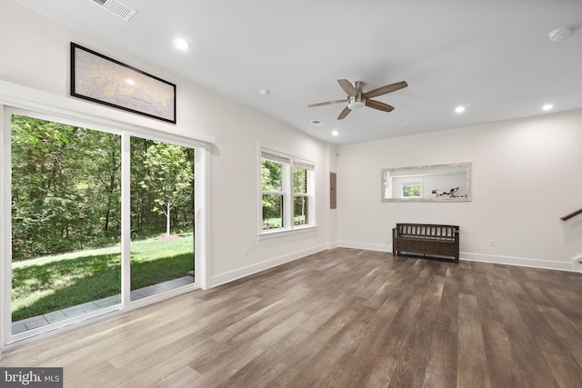 1653 Bandit Loop, Reston, VA 20190 - unfurnished living room with wood finished floors, a ceiling fan, baseboards, and recessed lighting