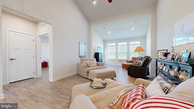 21042 Wavecrest Ter Unit 23, Lewes, DE 19958 - living room featuring baseboards, ceiling fan, visible vents, high vaulted ceiling, and light wood-style floors