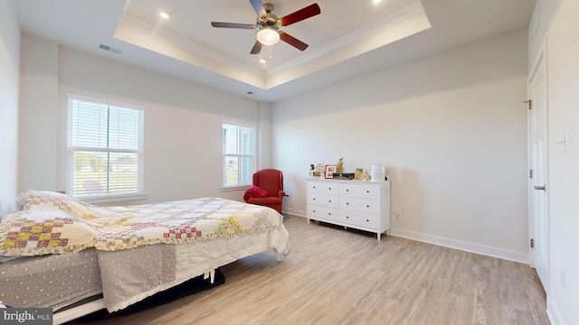 21042 Wavecrest Ter Unit 23, Lewes, DE 19958 - bedroom featuring wood finished floors, visible vents, recessed lighting, a raised ceiling, and baseboards