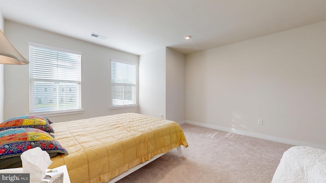 21042 Wavecrest Ter Unit 23, Lewes, DE 19958 - bedroom with baseboards, visible vents, and carpet