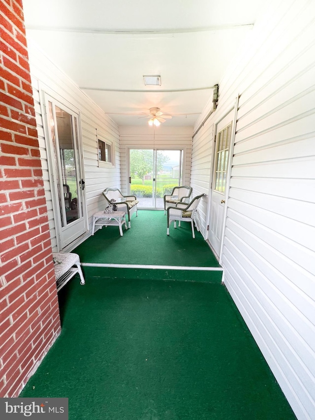 view of patio / terrace featuring covered porch and ceiling fan