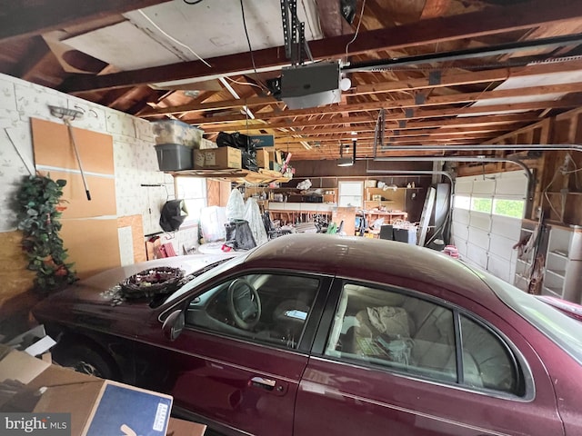 garage featuring a garage door opener