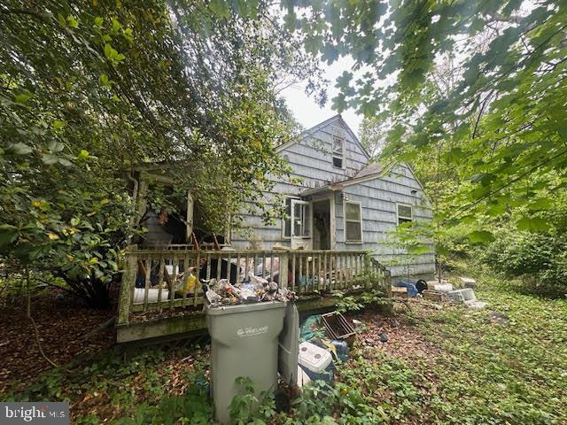 704 E Forest Grove Rd, Vineland, NJ 08360 - rear view of property with a deck