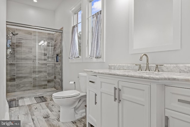22 Grassy Lake Rd, Shamong, NJ 08088 - full bath with toilet, a shower stall, vanity, wood finished floors, and recessed lighting