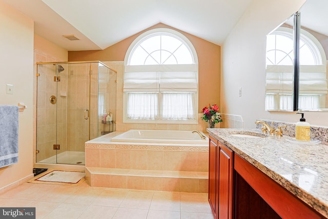 82 Granville Way, Exton, PA 19341 - bathroom featuring visible vents, vaulted ceiling, tile patterned flooring, a shower stall, and a garden tub