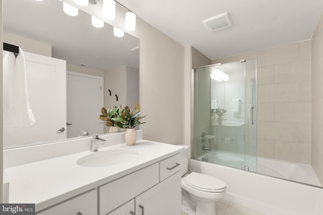 50 Florida Ave NE Unit 312, Washington, DC 20002 - bathroom with toilet, vanity, combined bath / shower with glass door, and tile patterned flooring