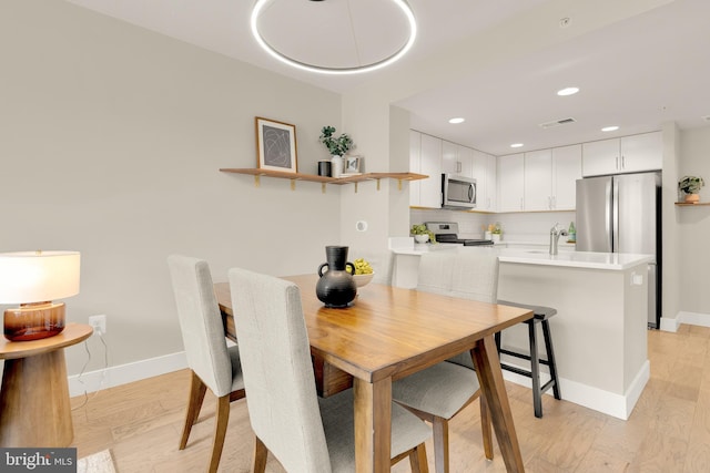 50 Florida Ave NE Unit 312, Washington, DC 20002 - dining room featuring baseboards, light wood-type flooring, and recessed lighting