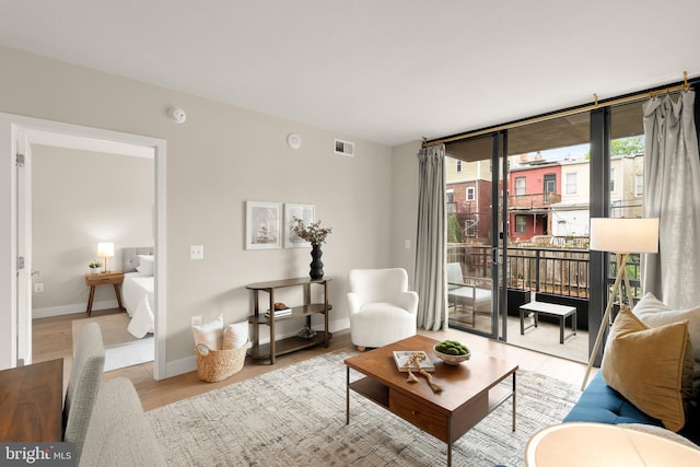 50 Florida Ave NE Unit 312, Washington, DC 20002 - living area featuring wood finished floors and baseboards