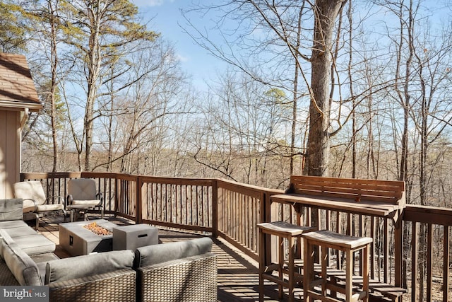 deck with a fire pit