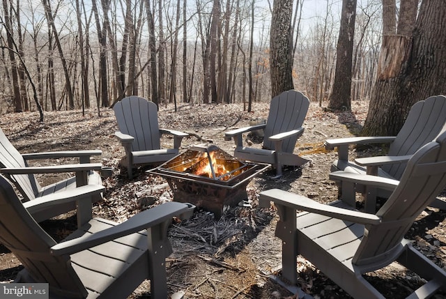 view of patio / terrace with a fire pit