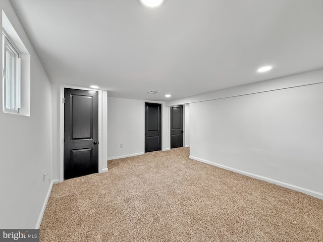 finished basement with baseboards, carpet flooring, and recessed lighting