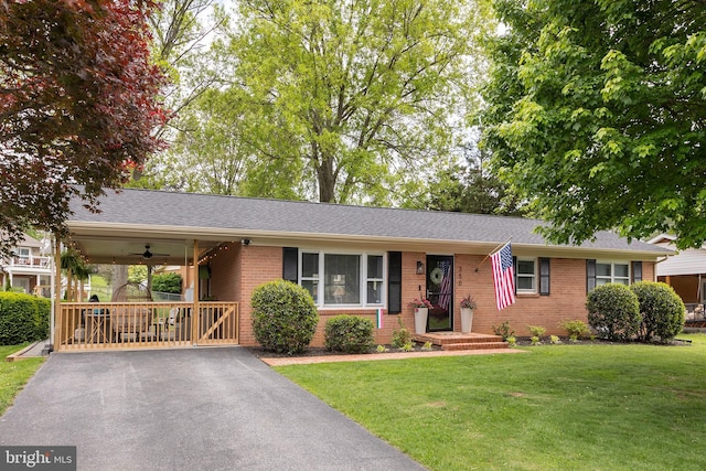 350 Lanny Dr, Winchester, VA 22601 - single story home featuring brick siding, a front yard, driveway, and a ceiling fan