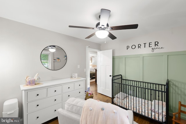 350 Lanny Dr, Winchester, VA 22601 - bedroom with a crib, wood finished floors, and a ceiling fan