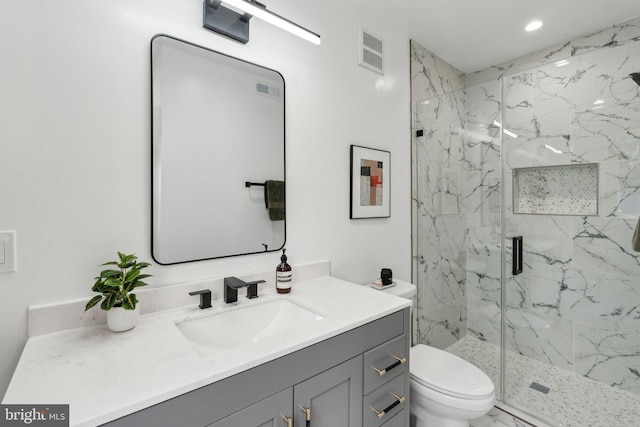 660 Columbia Rd NW, Washington, DC 20001 - bathroom featuring a marble finish shower, toilet, vanity, and recessed lighting