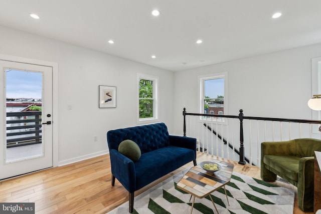 660 Columbia Rd NW, Washington, DC 20001 - sitting room with an upstairs landing, light wood-type flooring, recessed lighting, and baseboards