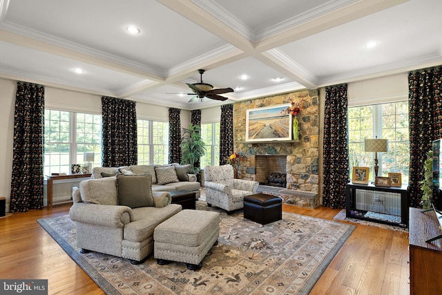 107 Centrenest Ln, Wilmington, DE 19807 - living room with a stone fireplace, beamed ceiling, crown molding, and plenty of natural light