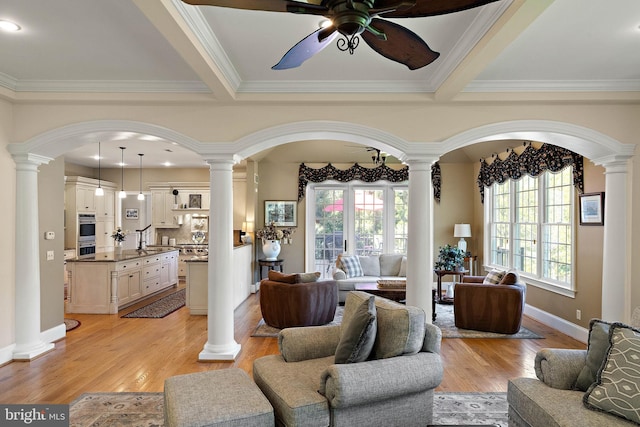 107 Centrenest Ln, Wilmington, DE 19807 - living area featuring arched walkways, ornamental molding, ceiling fan, and decorative columns