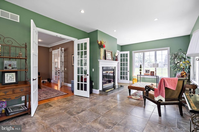 107 Centrenest Ln, Wilmington, DE 19807 - living area featuring french doors, recessed lighting, baseboards, visible vents, and crown molding